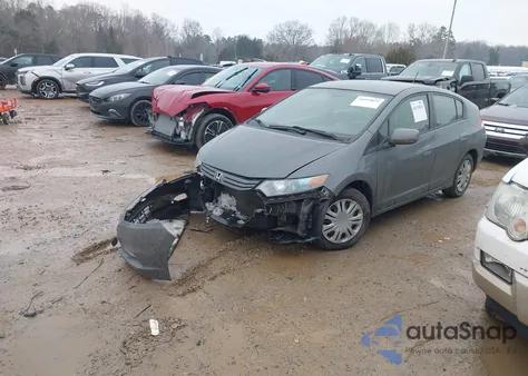 2010 Honda Insight Lx z USA, uszkodzony, nr VIN JHMZE2H5XAS014898
